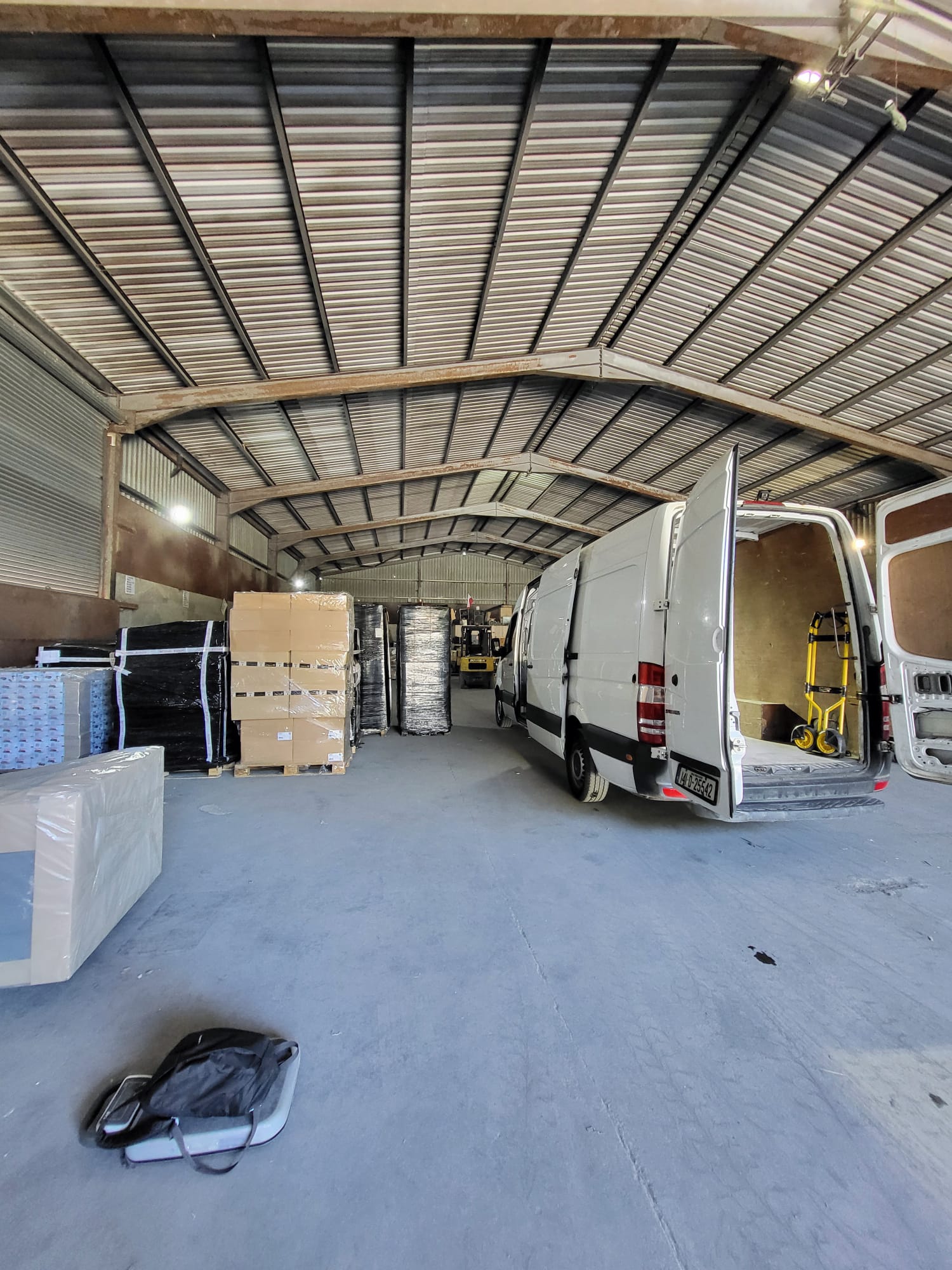 SpeedPack warehouse with delivery vans